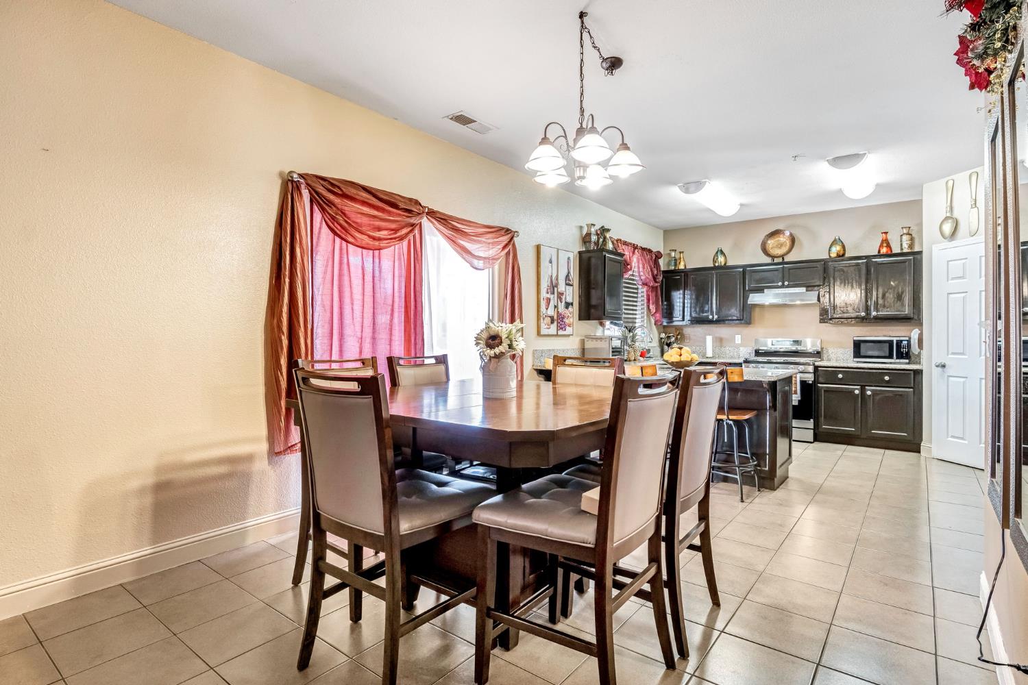 877 Sandra Avenue Sanger, CA 93657 - Photo 10 of 40 a view of a dining room and livingroom view