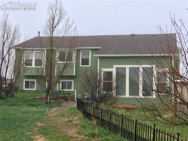 13415 Mc Cune Road Elbert, CO 80106 - Photo 8 of 8 Windows galore make this property a very special place to call home.