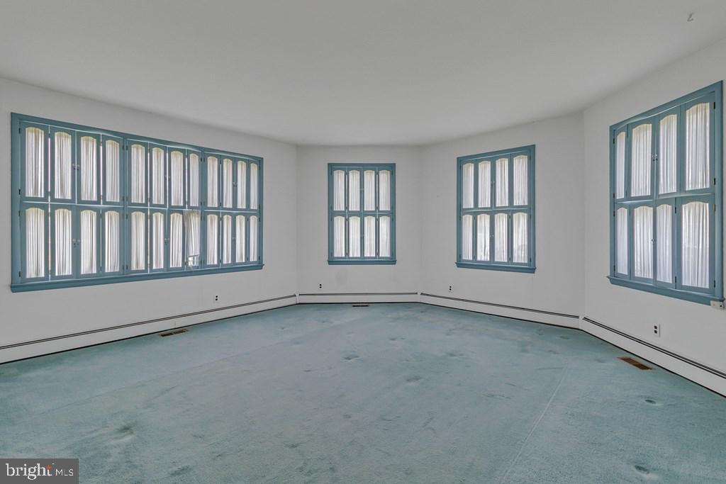 742 Main Street Reedville, VA 22539 - Photo 14 of 66 Bright, airy space with charming windows.