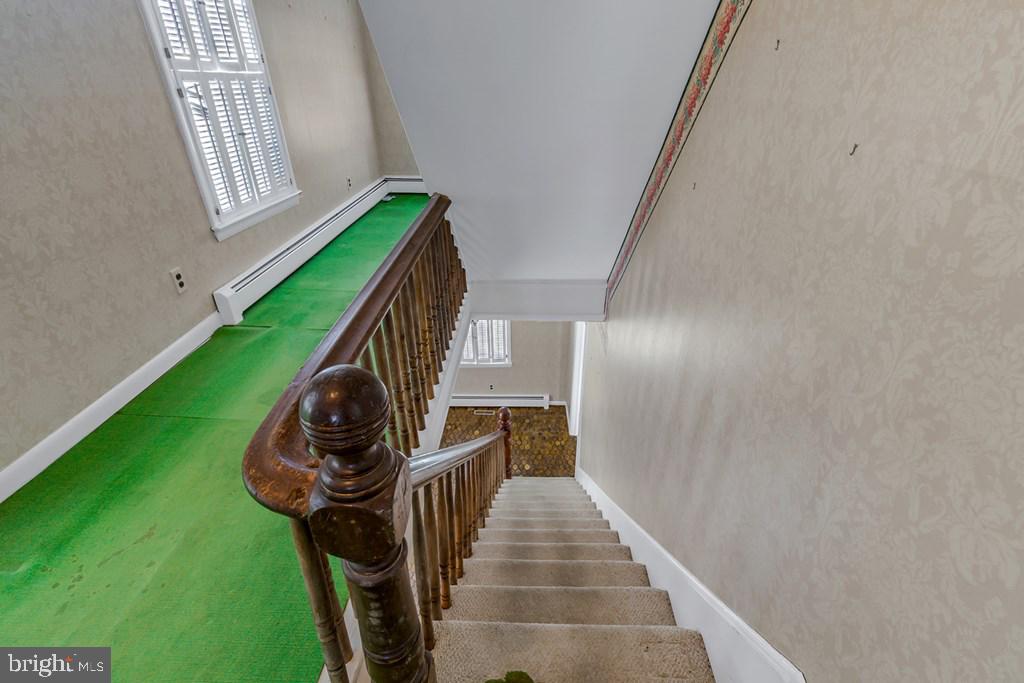 742 Main Street Reedville, VA 22539 - Photo 24 of 66 Charming staircase with vintage appeal.