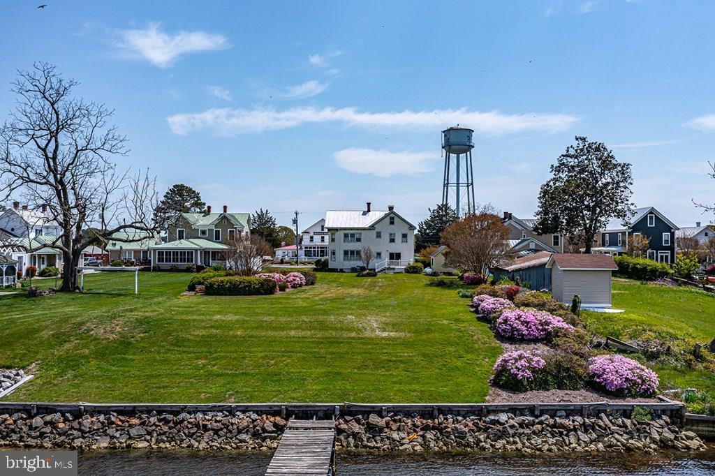 742 Main Street Reedville, VA 22539 - Photo 48 of 66 Charming waterfront retreat with blooms.