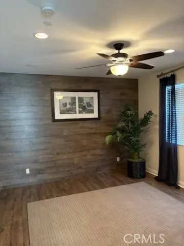 a view of a livingroom with a potted plant