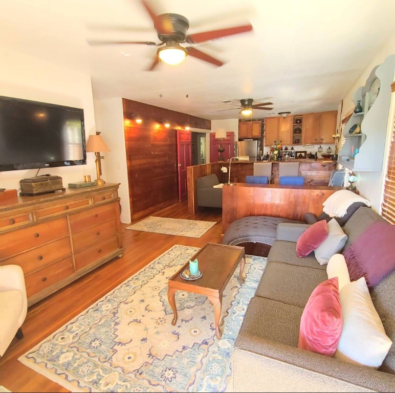 1427 Munger Street Houston, TX 77023 - Photo 2 of 24 a living room with furniture and a flat screen tv