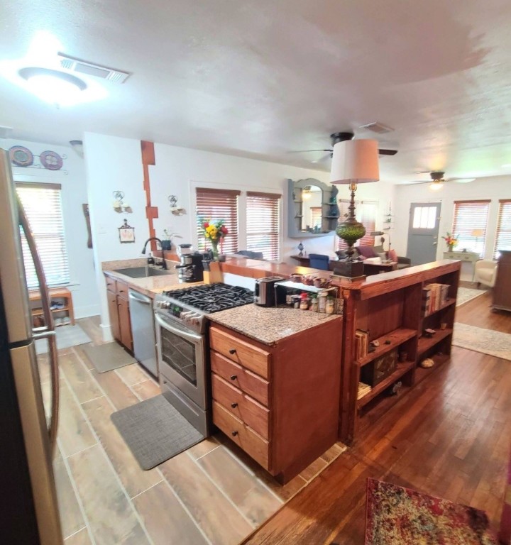 1427 Munger Street Houston, TX 77023 - Photo 8 of 24 a kitchen with a stove and a sink