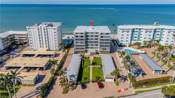 an aerial view of a house with a garden