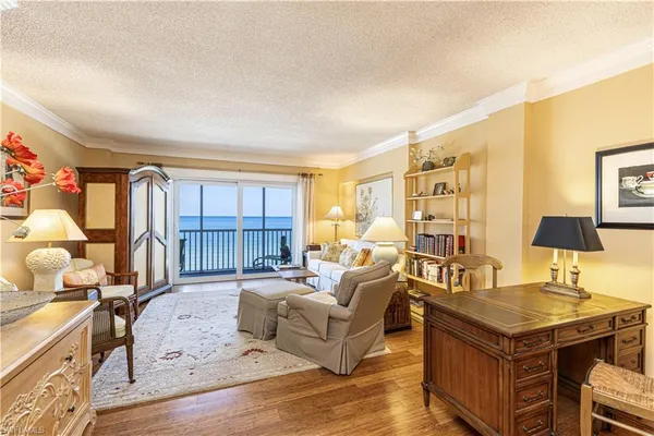 a living room with furniture and a table