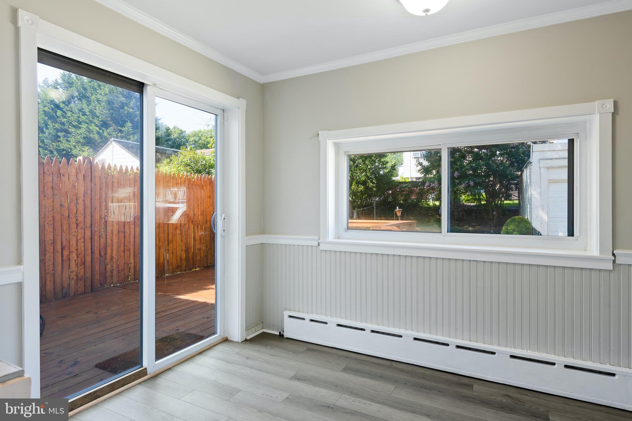 140 Woodbine Road Havertown, PA 19083 - Photo 13 of 26 Sliding glass doors off kitchen to deck