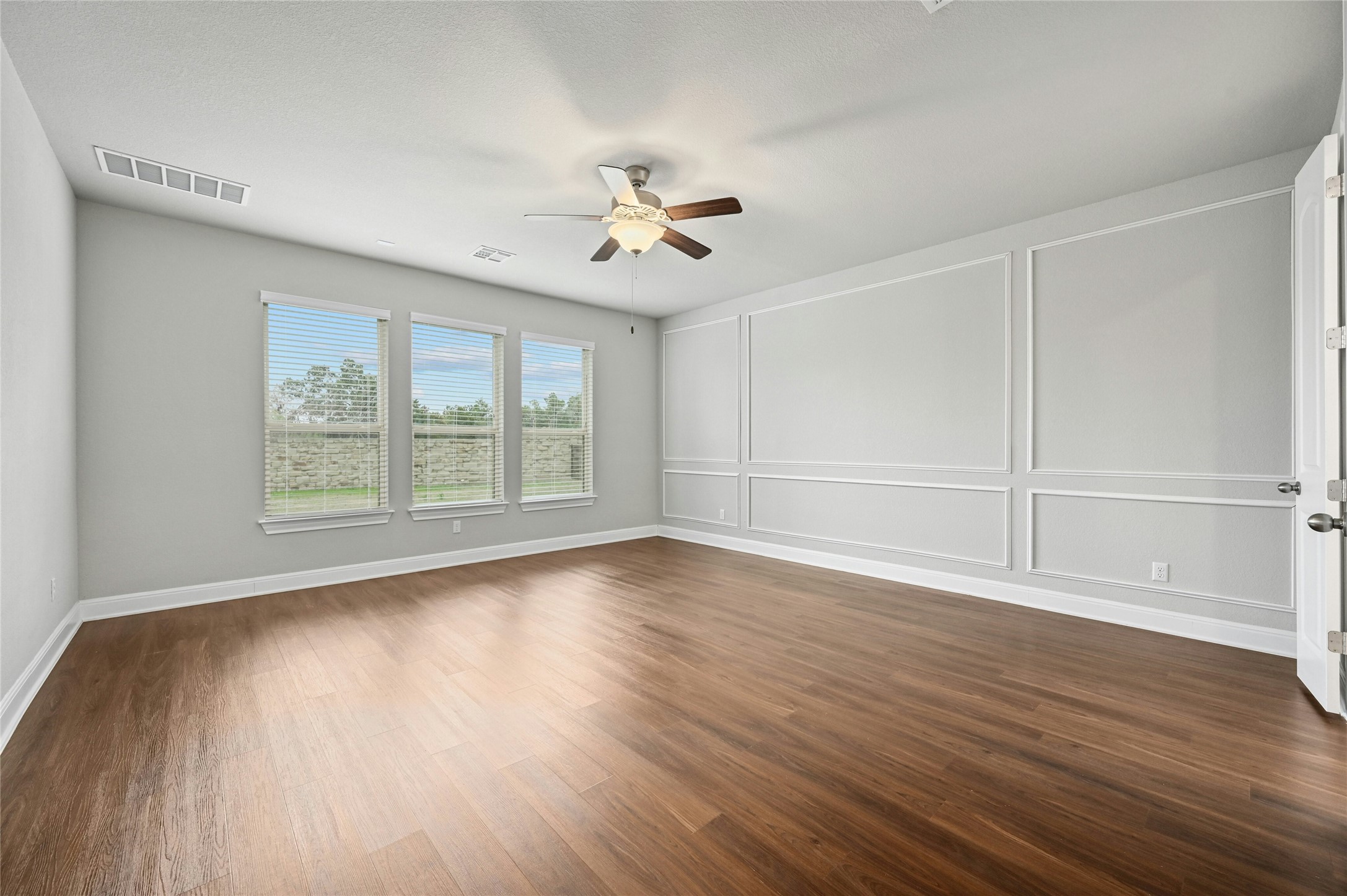 4124 Florentine Road Leander, TX 78641 - Photo 15 of 37 Unfurnished room featuring ceiling fan and wood-type flooring