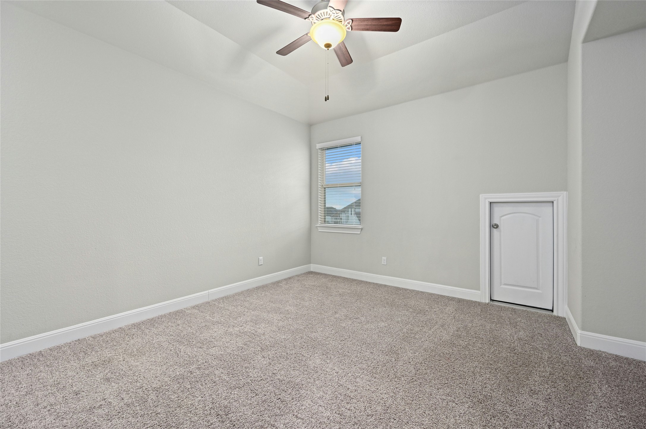 4124 Florentine Road Leander, TX 78641 - Photo 20 of 37 Unfurnished room featuring ceiling fan, lofted ceiling, and carpet flooring