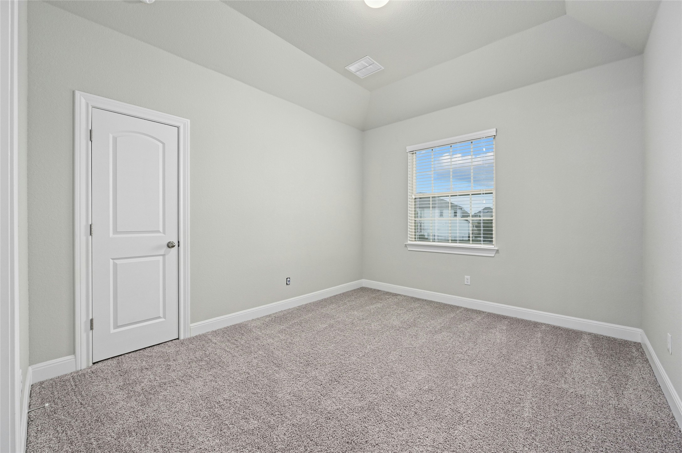 4124 Florentine Road Leander, TX 78641 - Photo 23 of 37 Unfurnished room with carpet flooring and lofted ceiling