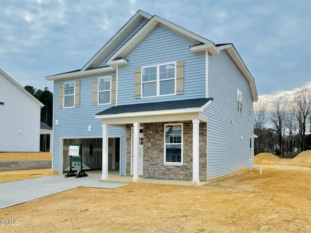 a view of a bathroom from a hallway