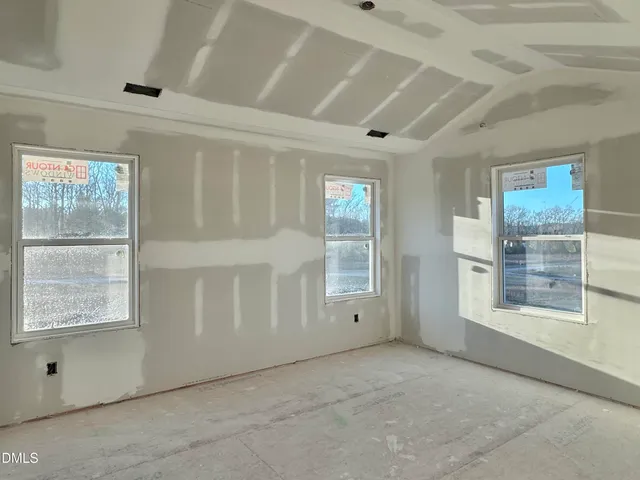 a swimming pool view with a outdoor seating