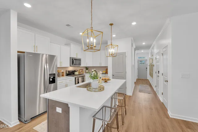 a view of a hallway with windows