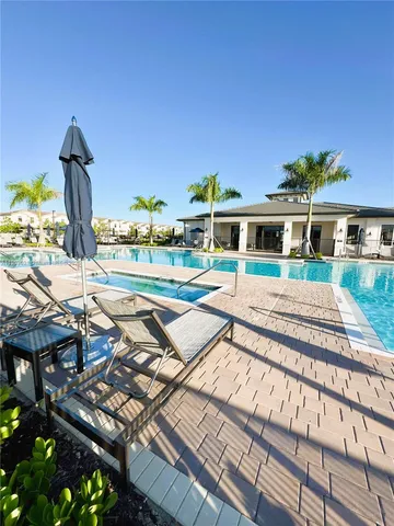 a view of a lake with furniture