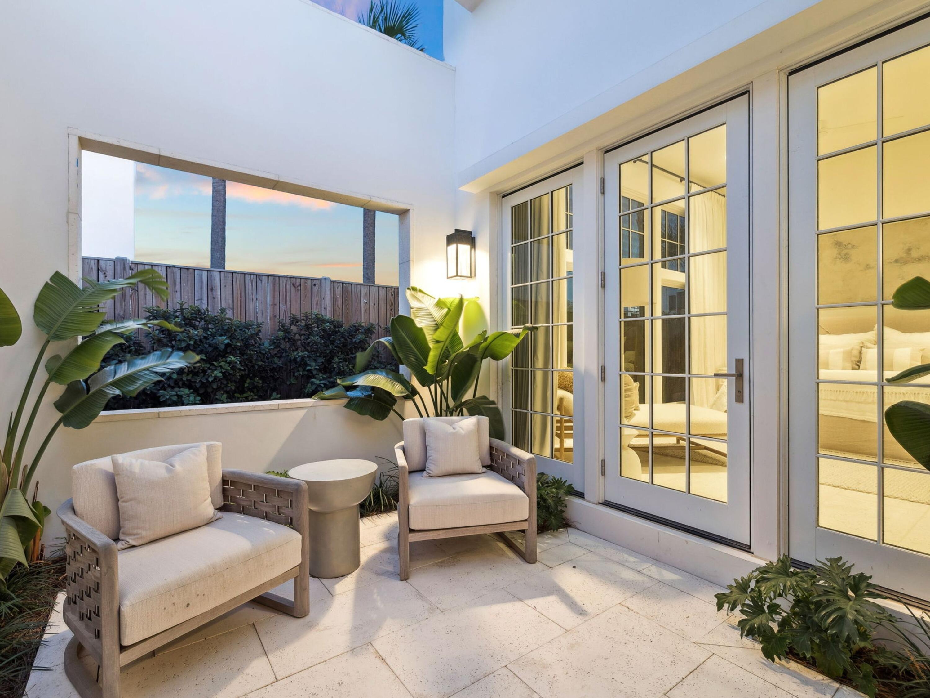 67 Kaiya Beach Ln Inlet Beach, Unit A Inlet Beach, FL 32461 - Photo 14 of 27 a living room with furniture and a potted plant