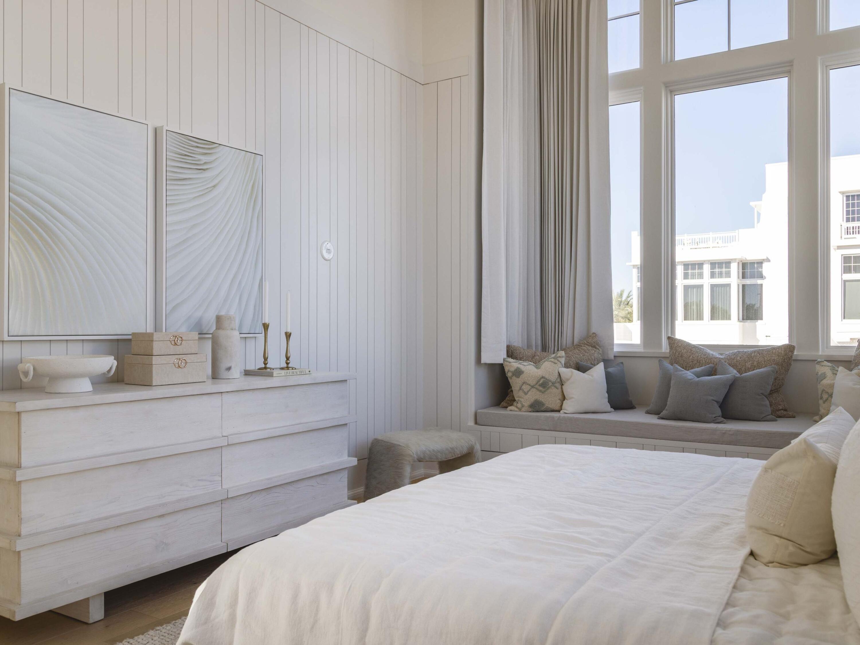 67 Kaiya Beach Ln Inlet Beach, Unit A Inlet Beach, FL 32461 - Photo 17 of 27 a bedroom with a bed and a large window