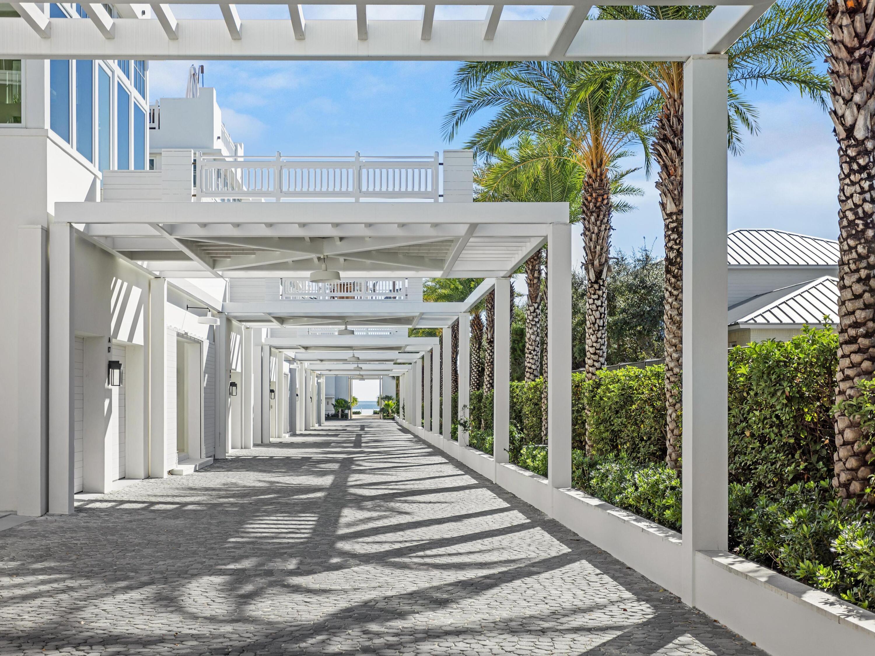 67 Kaiya Beach Ln Inlet Beach, Unit A Inlet Beach, FL 32461 - Photo 25 of 27 a view of a building with a porch