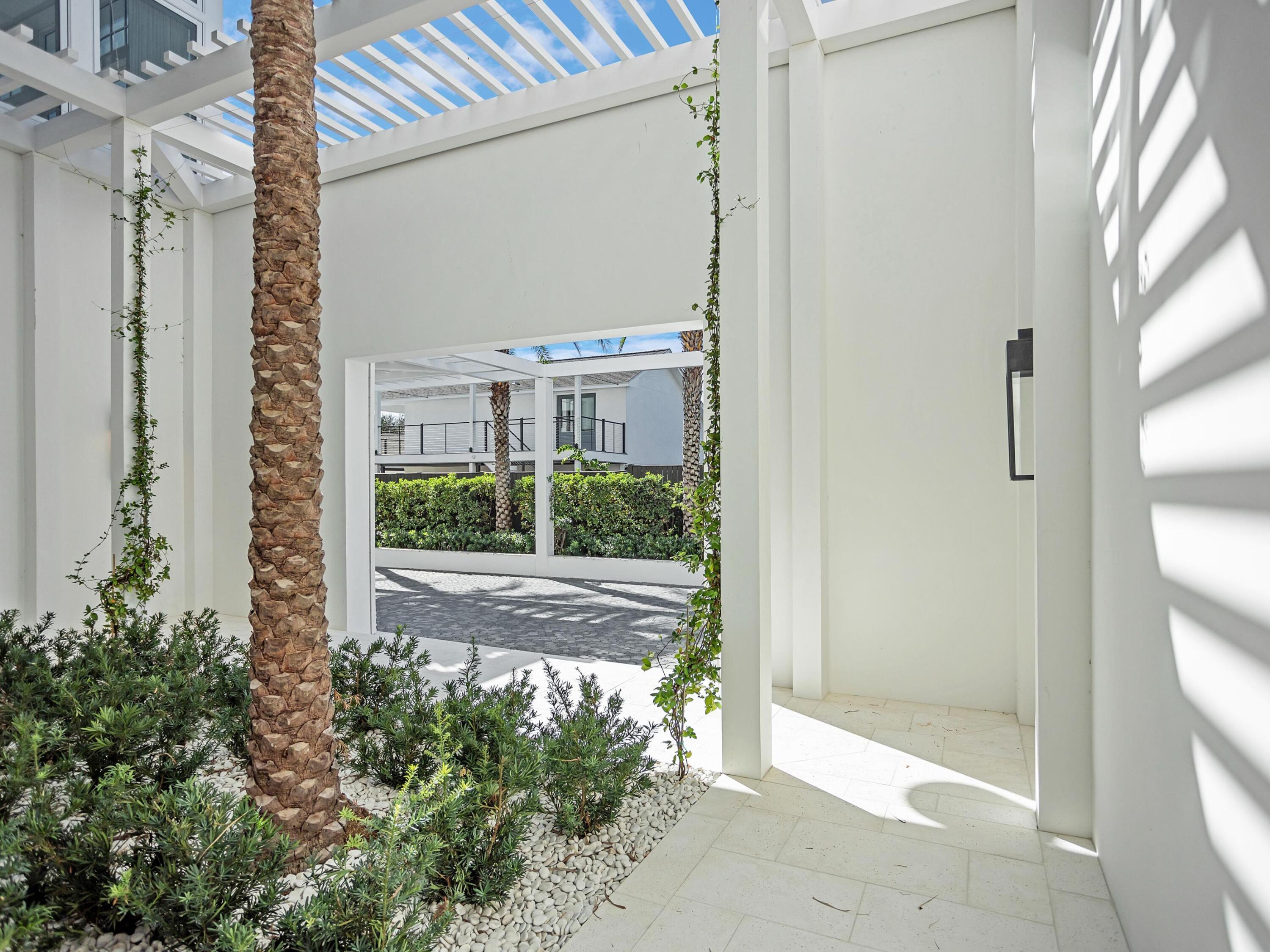 67 Kaiya Beach Ln Inlet Beach, Unit A Inlet Beach, FL 32461 - Photo 8 of 27 a view of a door of the house