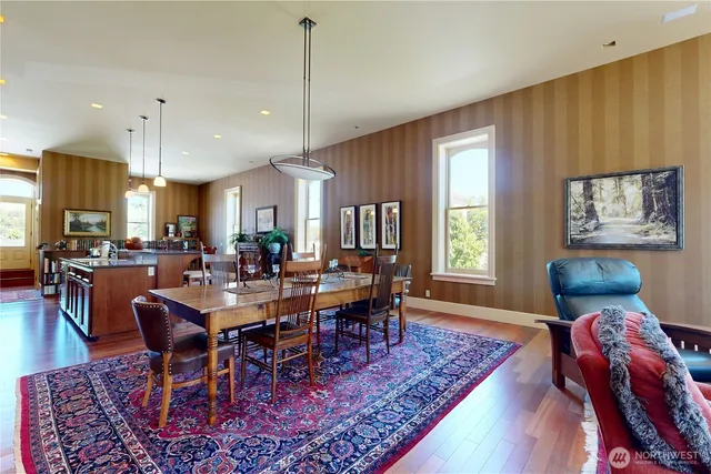 a view of a dining room with furniture