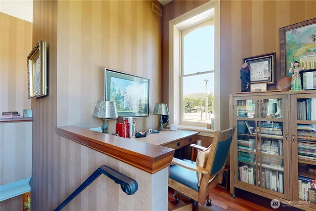 a room with furniture and a window