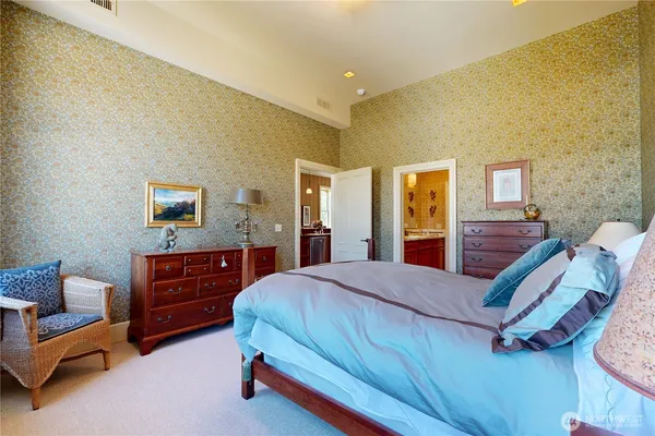 a bedroom with a bed and furniture