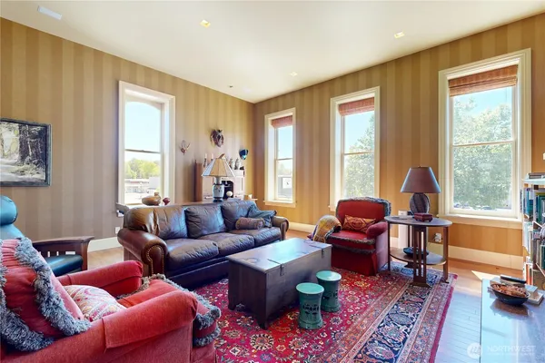 a living room with furniture and a window
