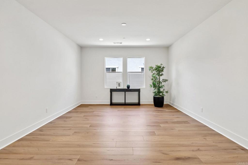 3521 Butler Place Escondido, CA 92027 - Photo 33 of 50 a view of a room with wooden floor and a window