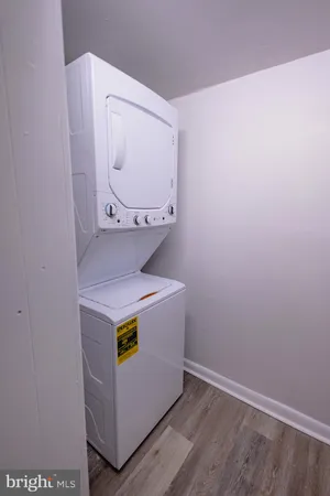 a view of a house with backyard and entertaining space