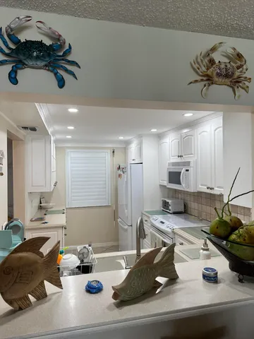 a bedroom with a bed and a lamp with window