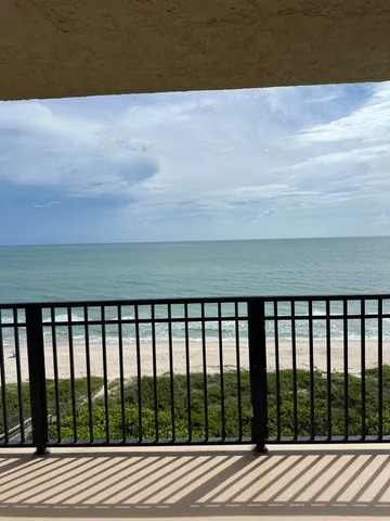 a bathroom with a double vanity sink mirror and shower