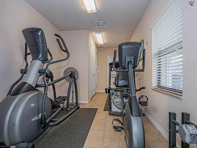 a view of a room with gym equipment