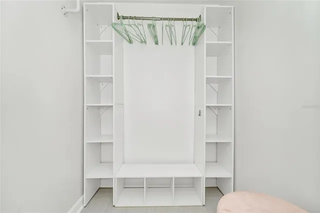 a bathroom with a shower and a toilet