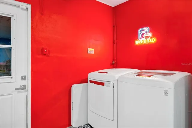 a room with a table and chairs