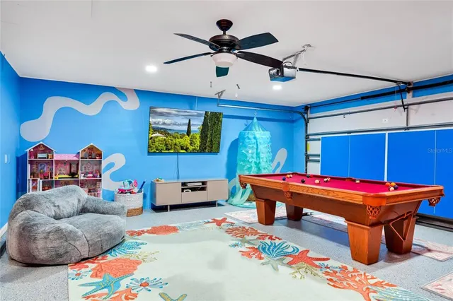 a room with furniture and musical instruments