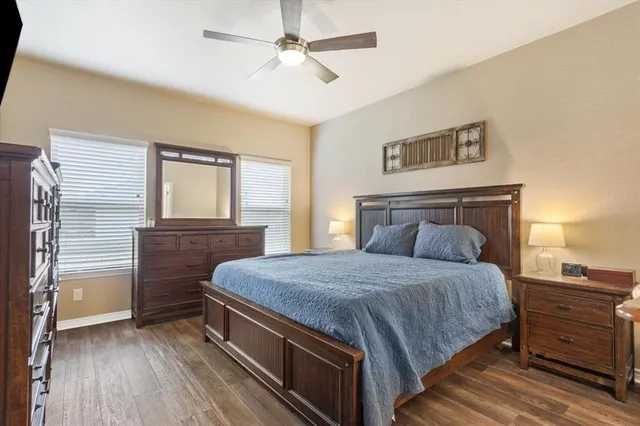 a bedroom with a bed and a dresser