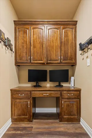 a stove top oven sitting inside of a kitchen