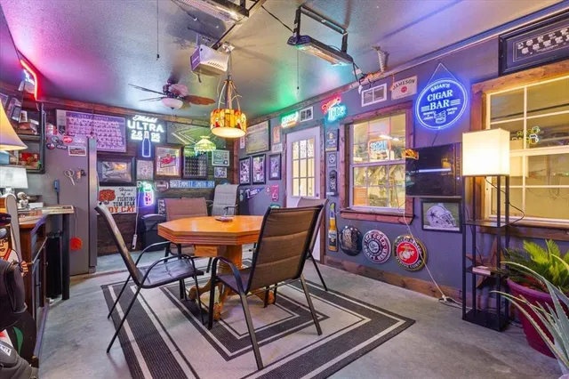 a view of a cafe with a table and chairs
