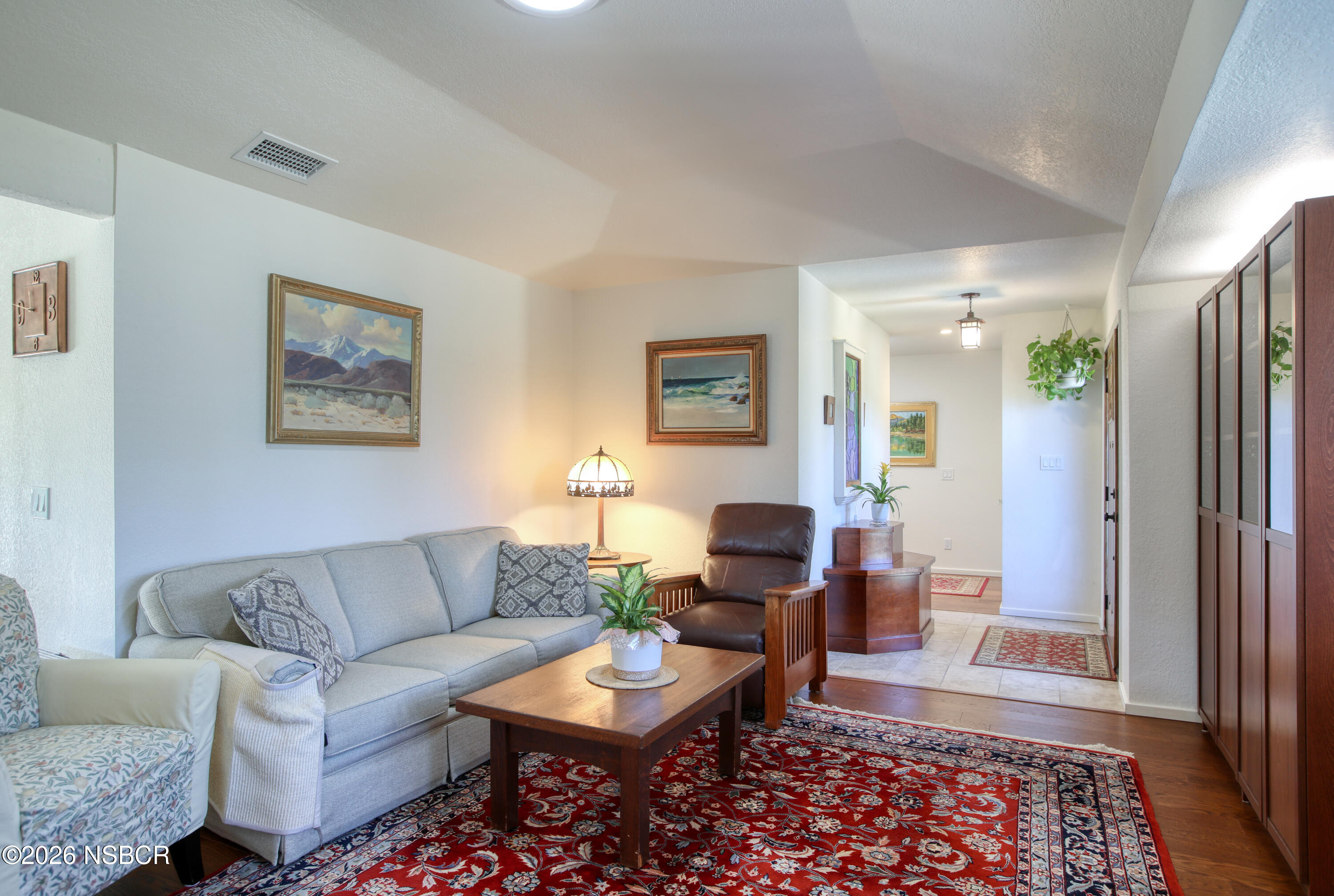 435-433 Eucalyptus Road, Unit 435433 Nipomo, CA 93444 - Photo 11 of 78 a living room with furniture and a rug