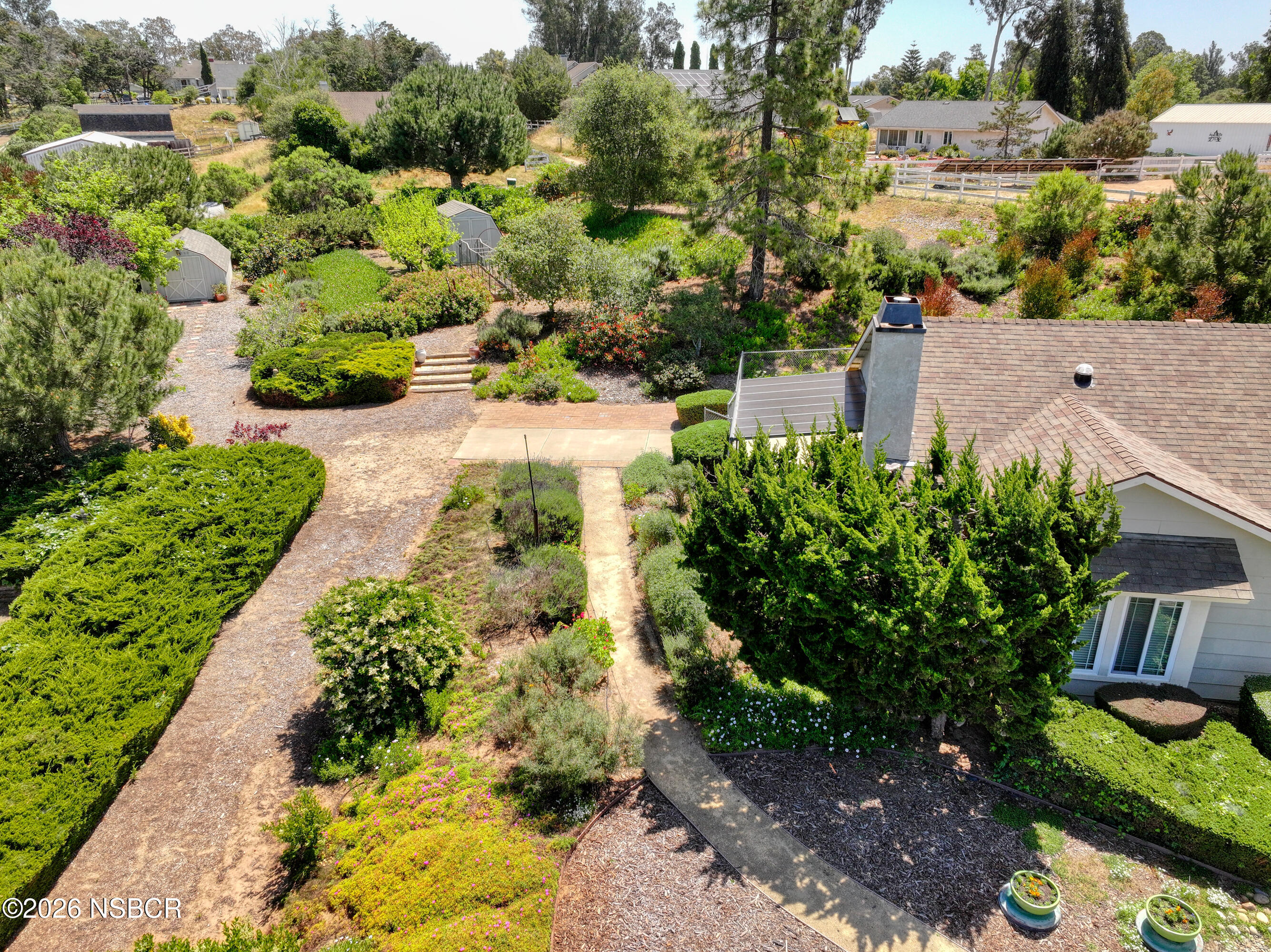 435-433 Eucalyptus Road, Unit 435433 Nipomo, CA 93444 - Photo 39 of 78 a view of a garden with a pathway