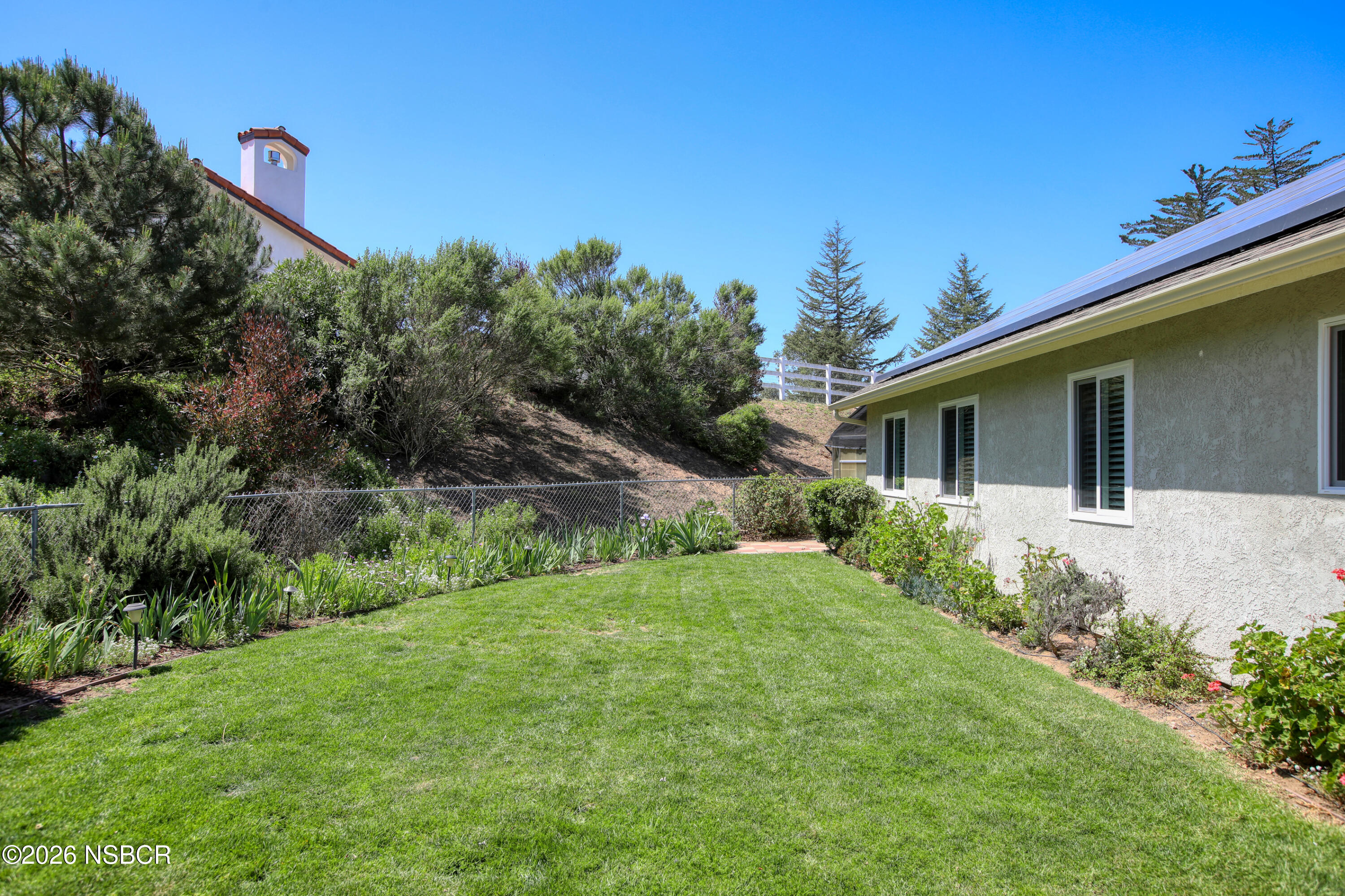 435-433 Eucalyptus Road, Unit 435433 Nipomo, CA 93444 - Photo 42 of 78 a house view with a garden space