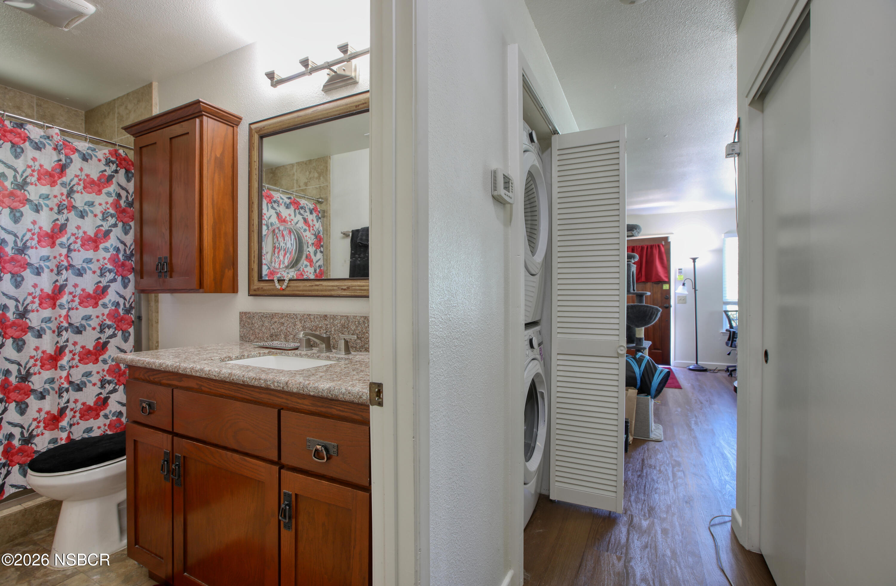 435-433 Eucalyptus Road, Unit 435433 Nipomo, CA 93444 - Photo 64 of 78 a bathroom with a sink vanity and a mirror