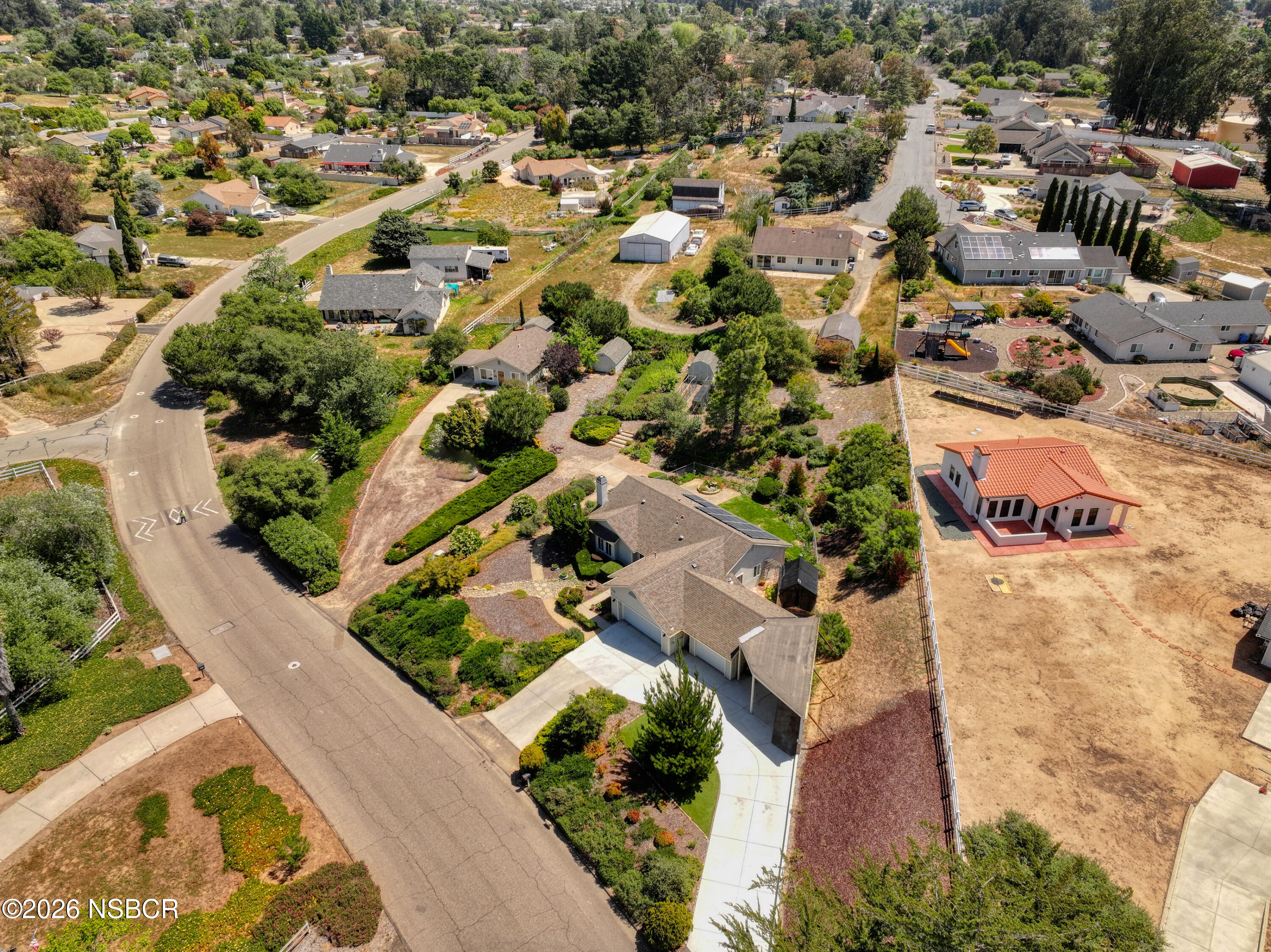 435-433 Eucalyptus Road, Unit 435433 Nipomo, CA 93444 - Photo 78 of 78 an aerial view of residential houses with outdoor space