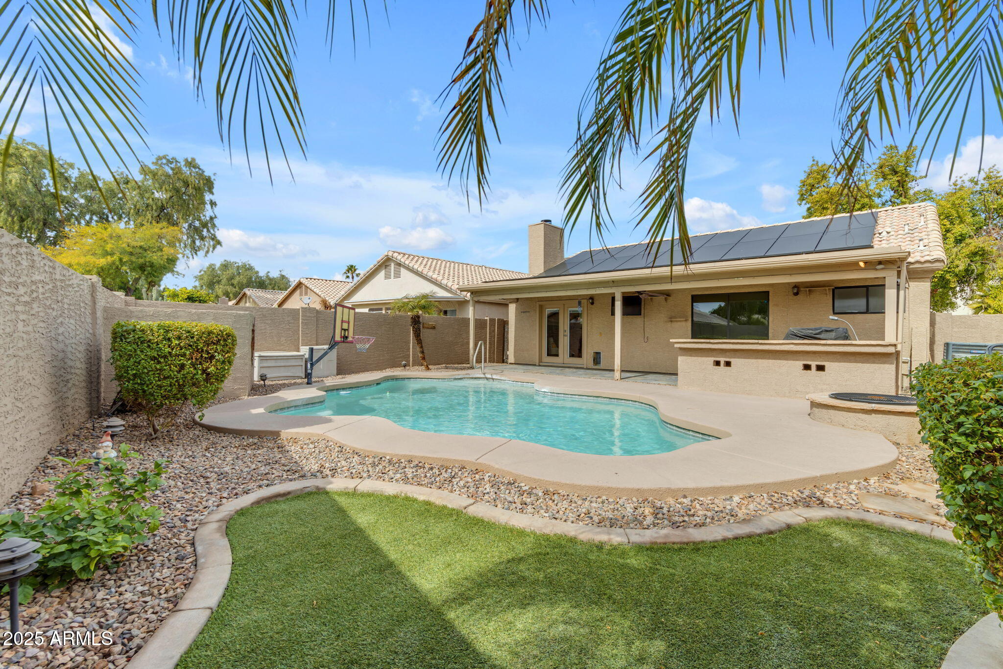 137 West Gary Way Gilbert, AZ 85233 - Photo 1 of 43 a view of house with a swimming pool