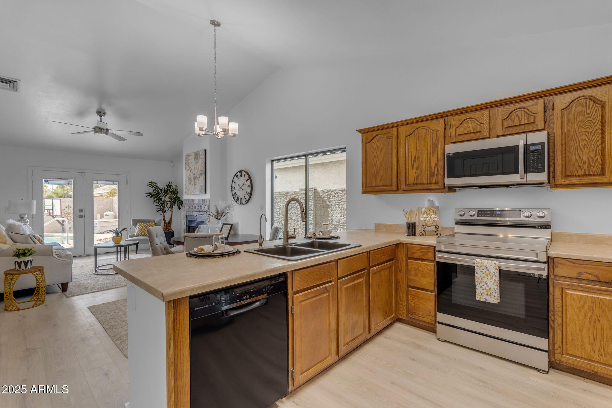 137 West Gary Way Gilbert, AZ 85233 - Photo 8 of 43 a kitchen with a sink stove and microwave