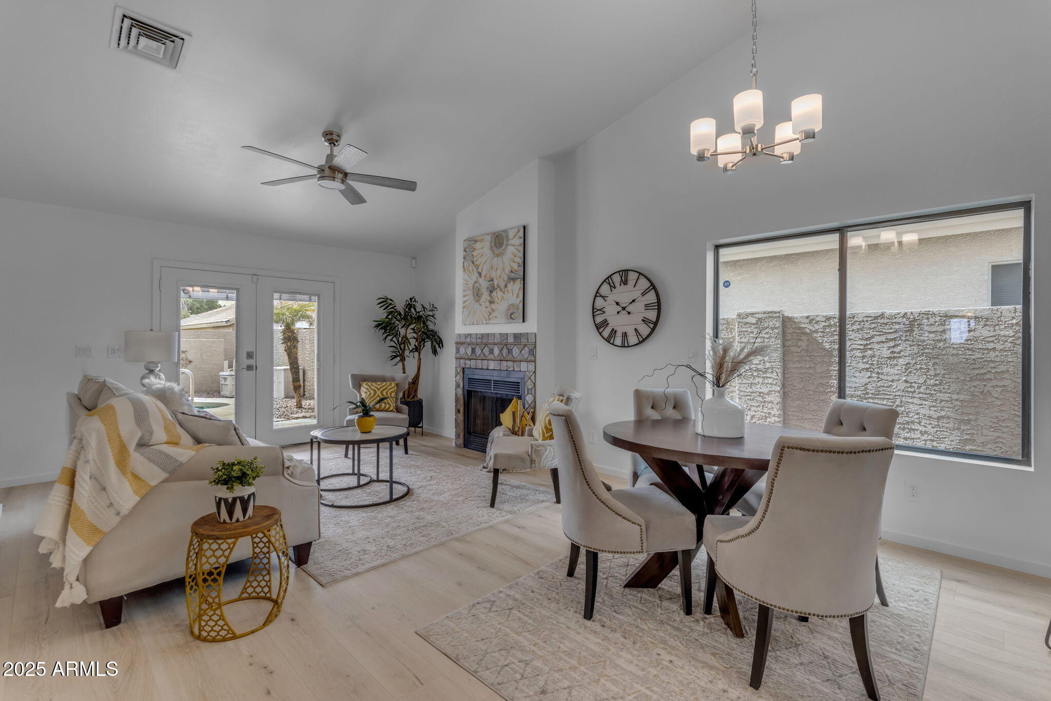 137 West Gary Way Gilbert, AZ 85233 - Photo 10 of 43 a view of a dining room with furniture window and wooden floor