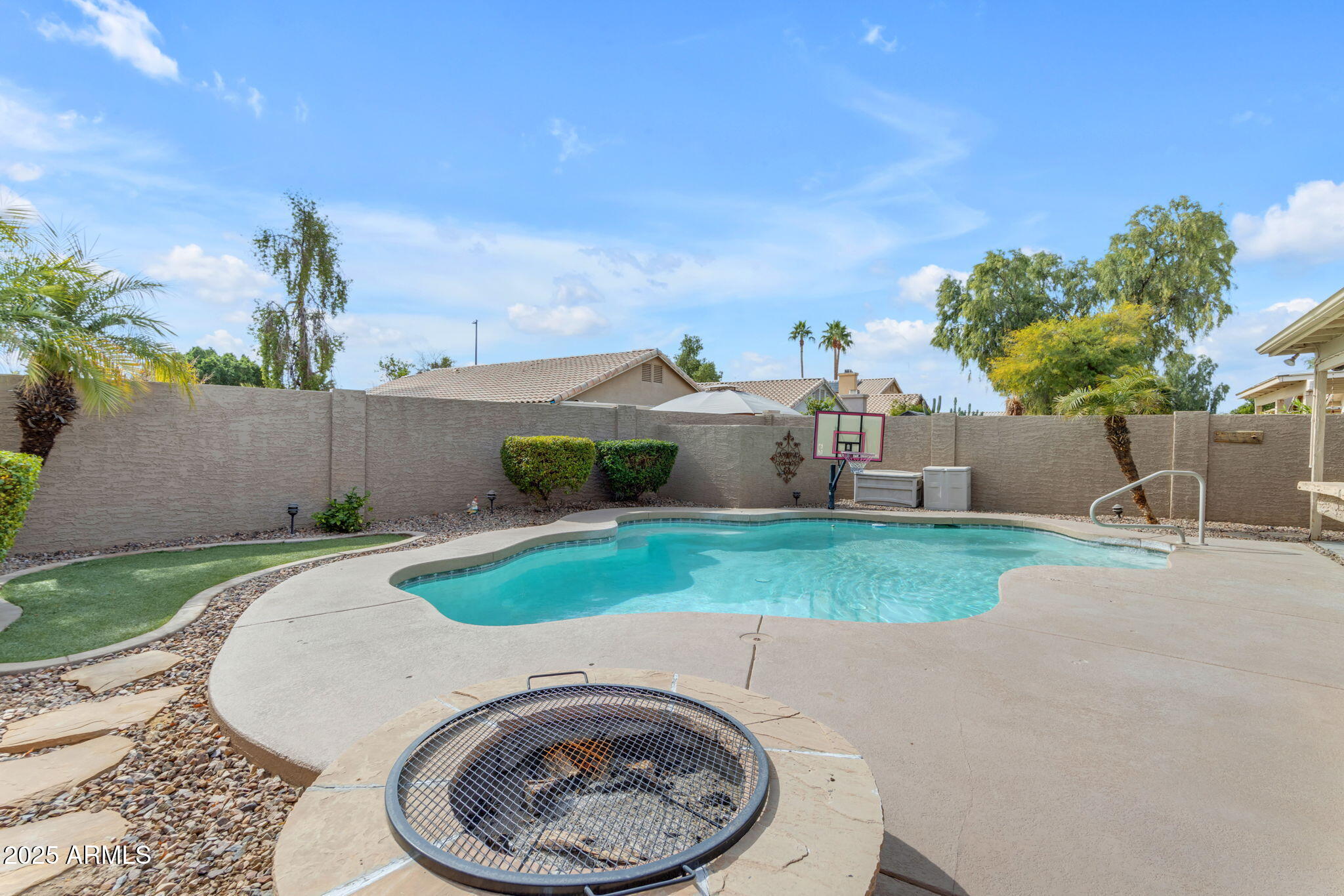 137 West Gary Way Gilbert, AZ 85233 - Photo 18 of 43 a view of a backyard with a garden and entertaining space