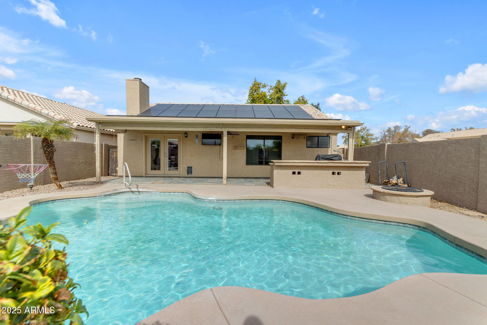137 West Gary Way Gilbert, AZ 85233 - Photo 19 of 43 a front view of a house with a yard