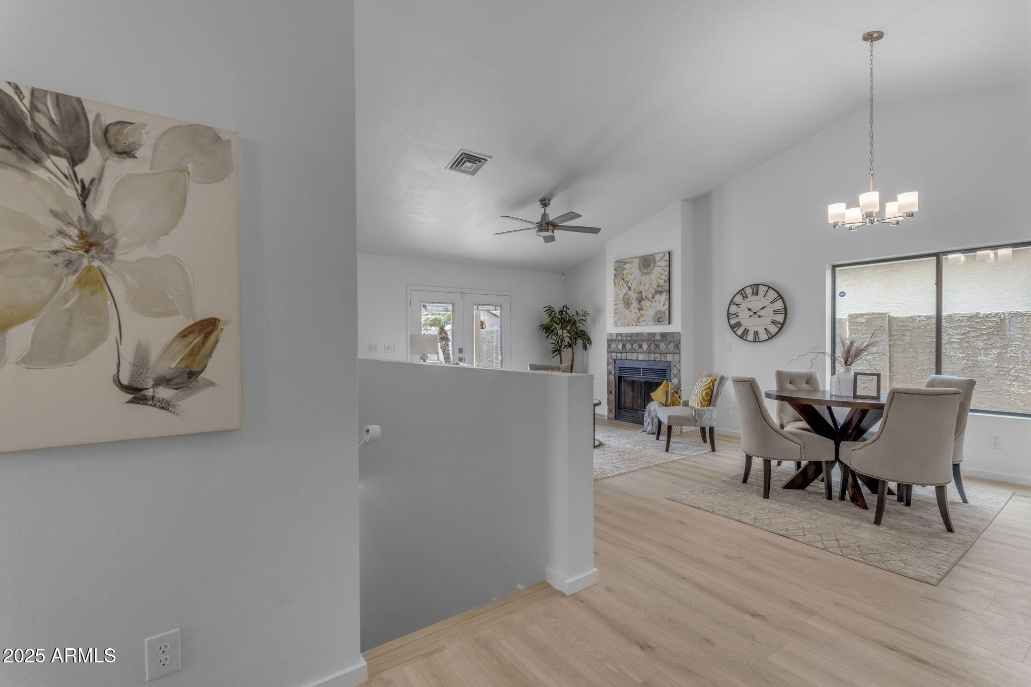 137 West Gary Way Gilbert, AZ 85233 - Photo 21 of 43 a view of a dining room with furniture and wooden floor
