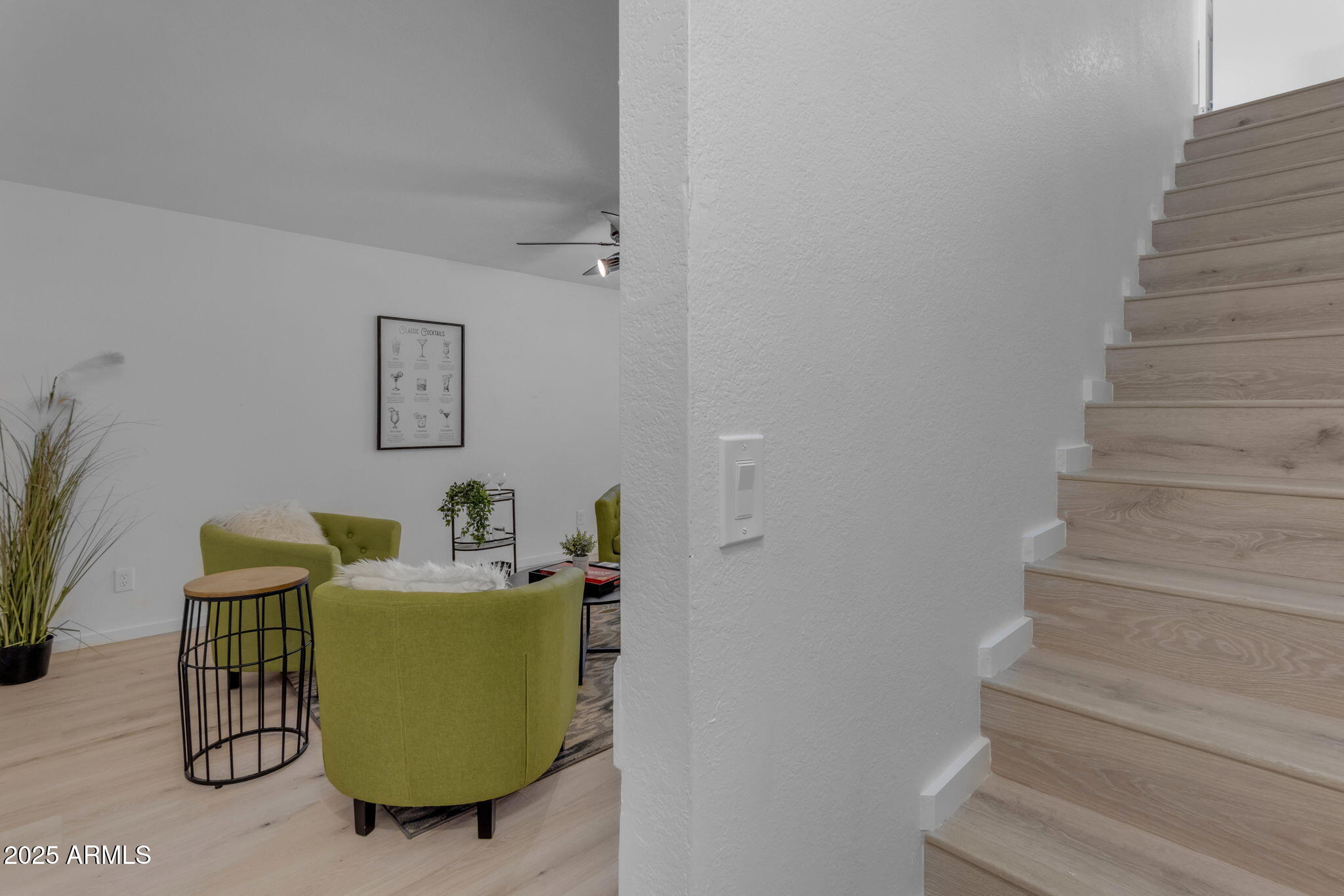 137 West Gary Way Gilbert, AZ 85233 - Photo 22 of 43 a living room with furniture and a stairs