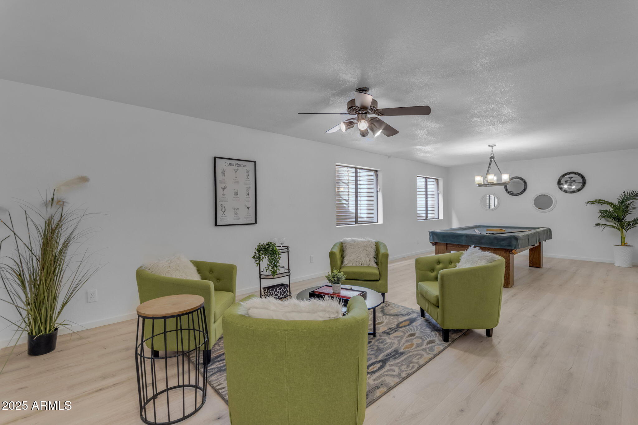 137 West Gary Way Gilbert, AZ 85233 - Photo 23 of 43 a living room with furniture and a wooden floor